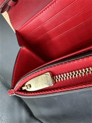 CHRISTIAN LOUBOUTIN POCHETTE WRISTLET